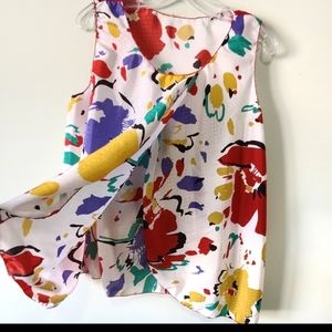 Sleeveless top open front tulip style blouse